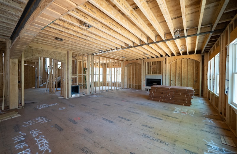 Interior wood framing of a room addition, including a fireplace rough-in